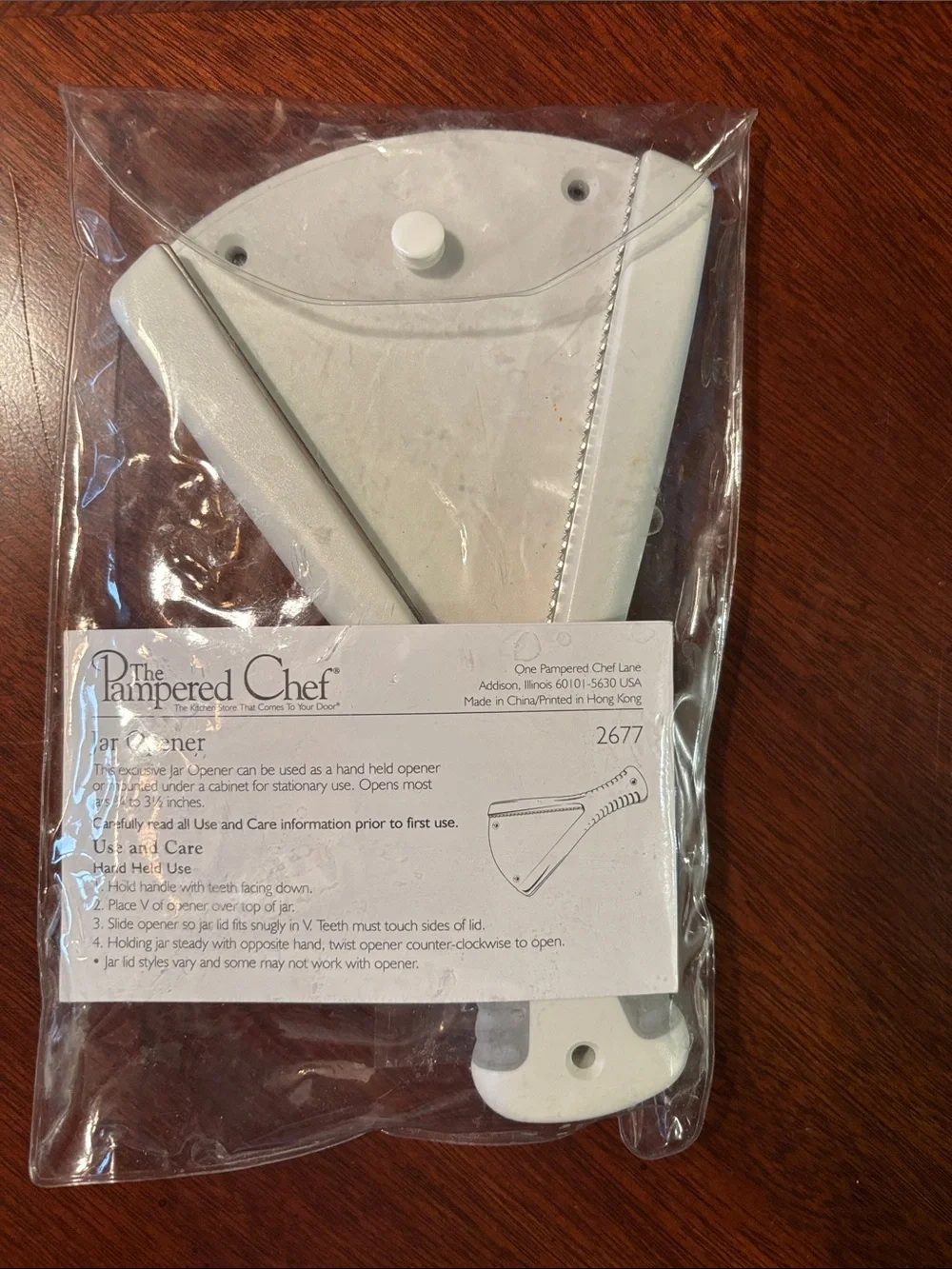 The Pampered Chef White Jar Opener - Handheld or Mountable